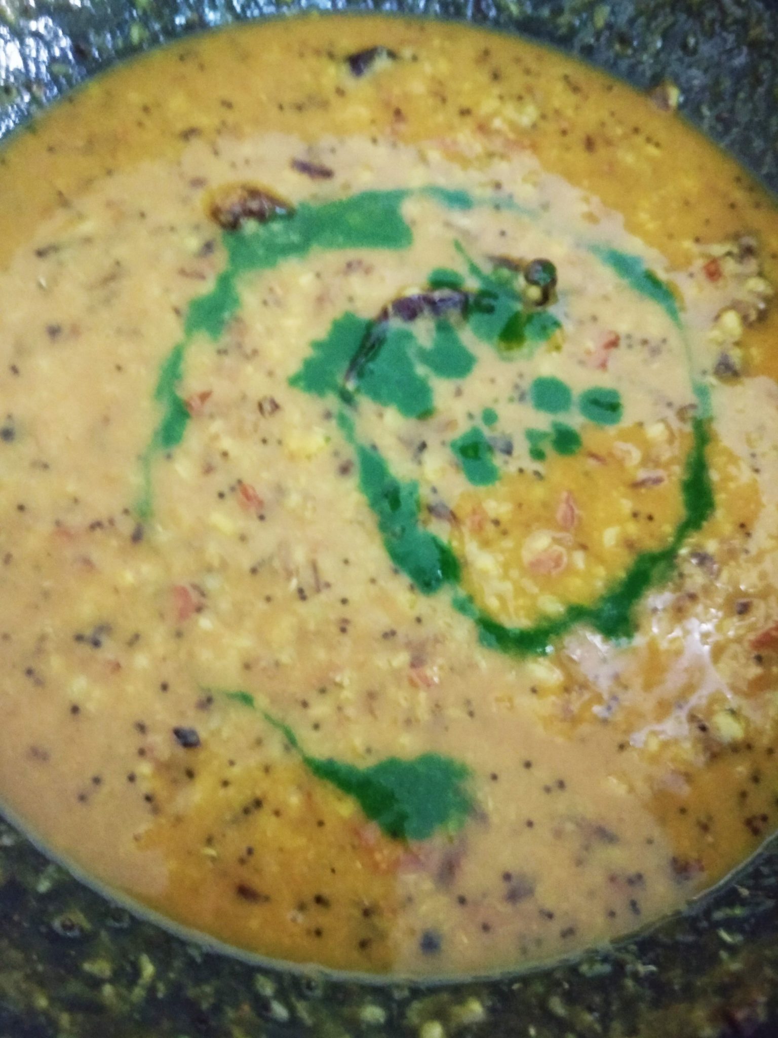 Add palak puree to the dal