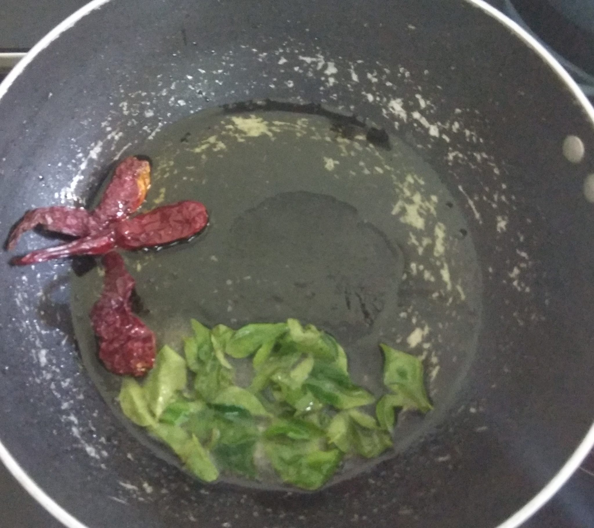 fry red chillies and curry leaves