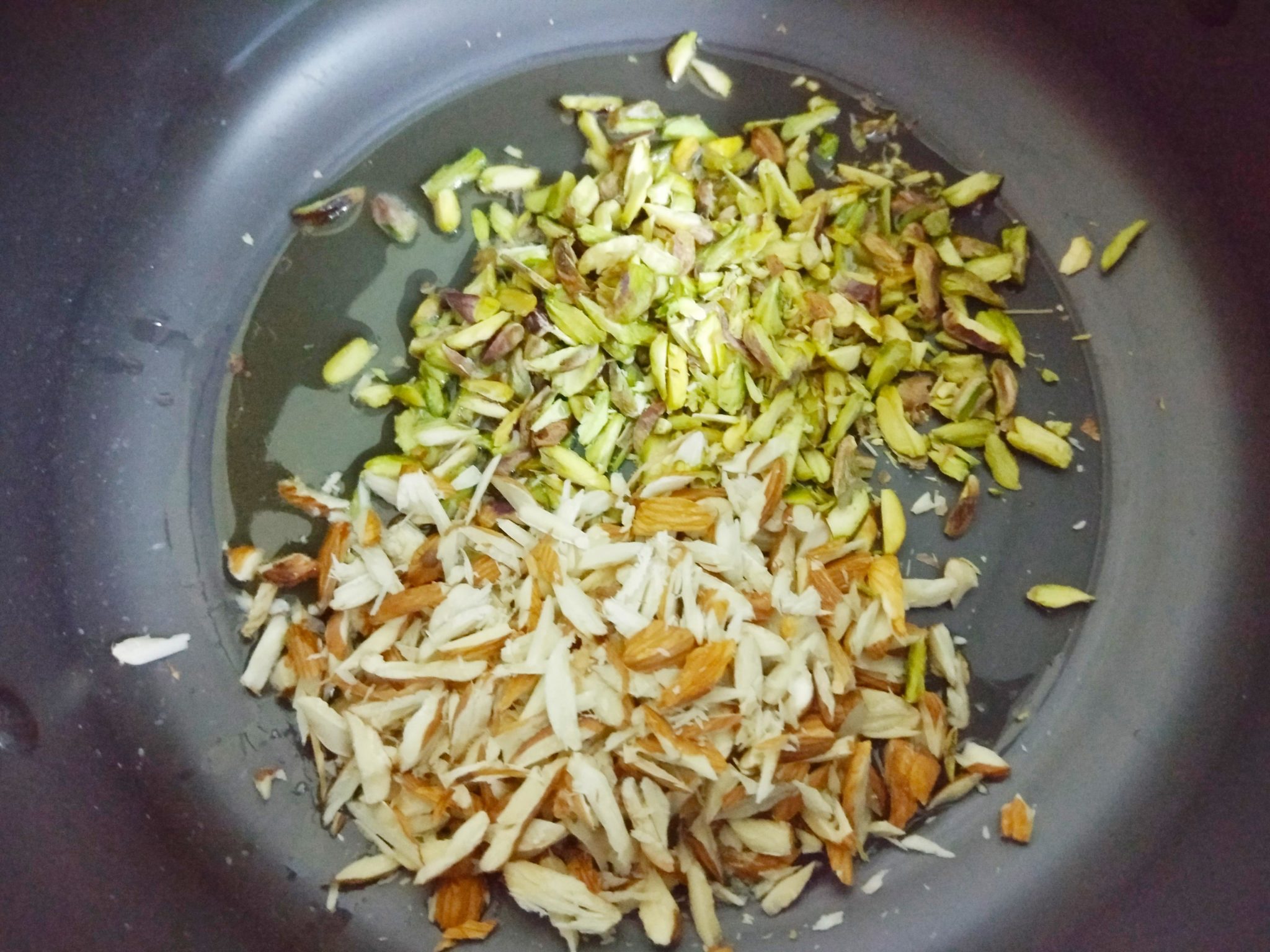 Fry the nuts in ghee