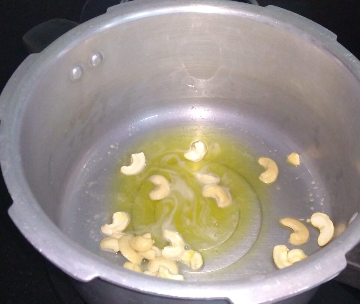 Fry cashews in ghee