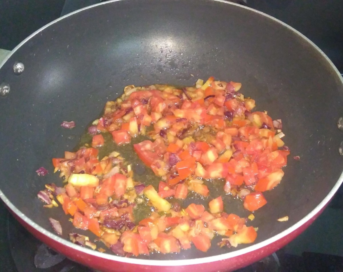 fry tomatoes till soft