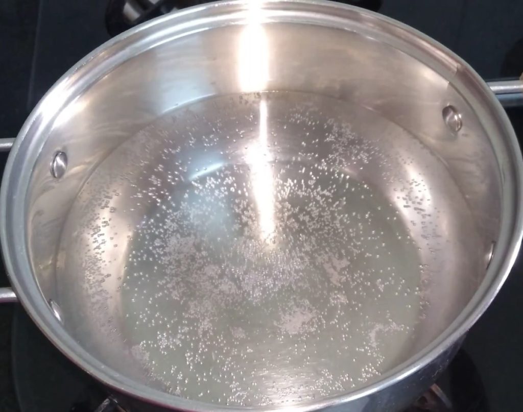 Boil water in a pan