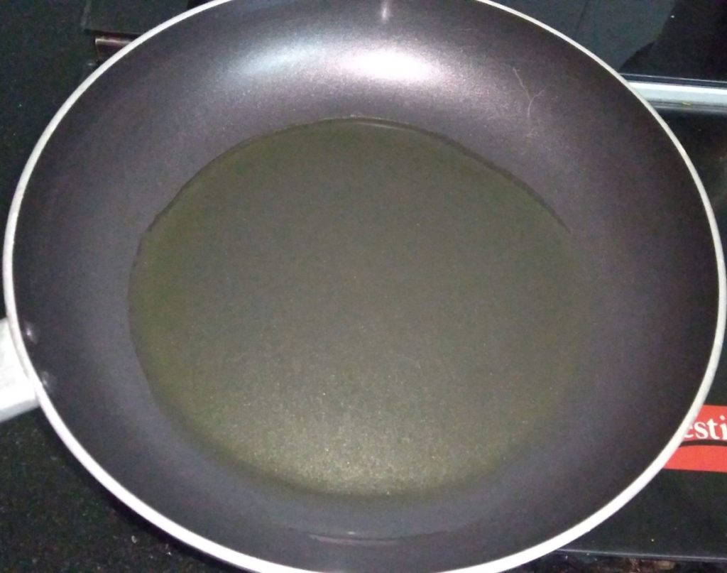 Heat oil in a pan