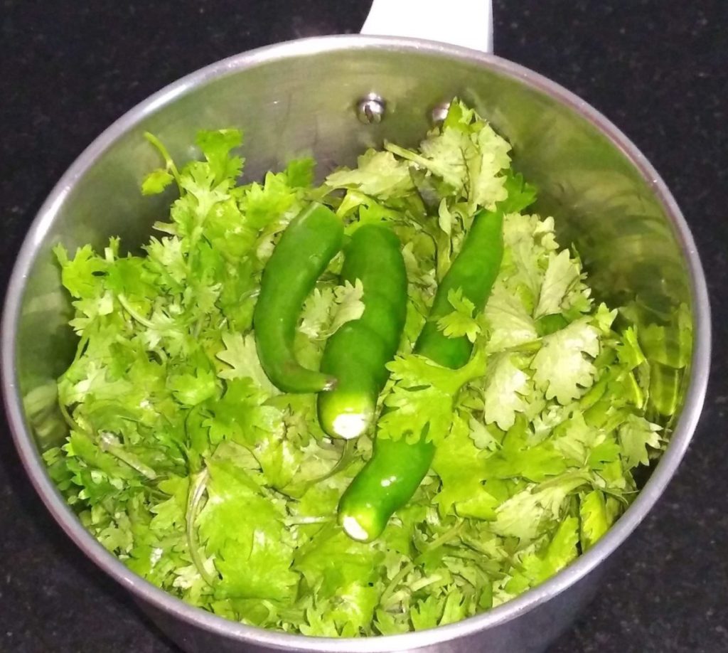 Grind Coriander and green chilly