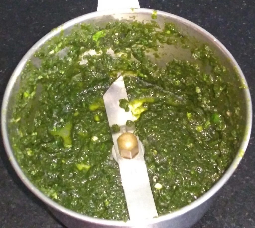 Make a paste of green chilly and coriander leaves