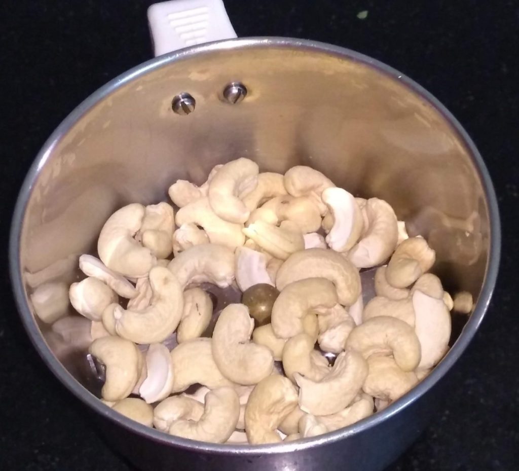 Take cashew and little water in a blender