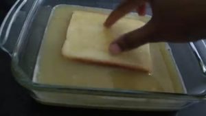 Dip the bread in egg mixture