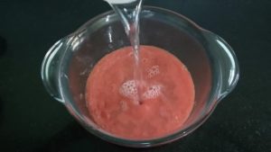 Add 2 cups of water to the tomato puree while preparing tomato soup