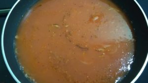 add boiled tomato puree to the pan