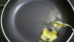 heat a pan and add a tsp of ghee