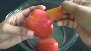 peel the skin of tomatoes for homemade tomato soup